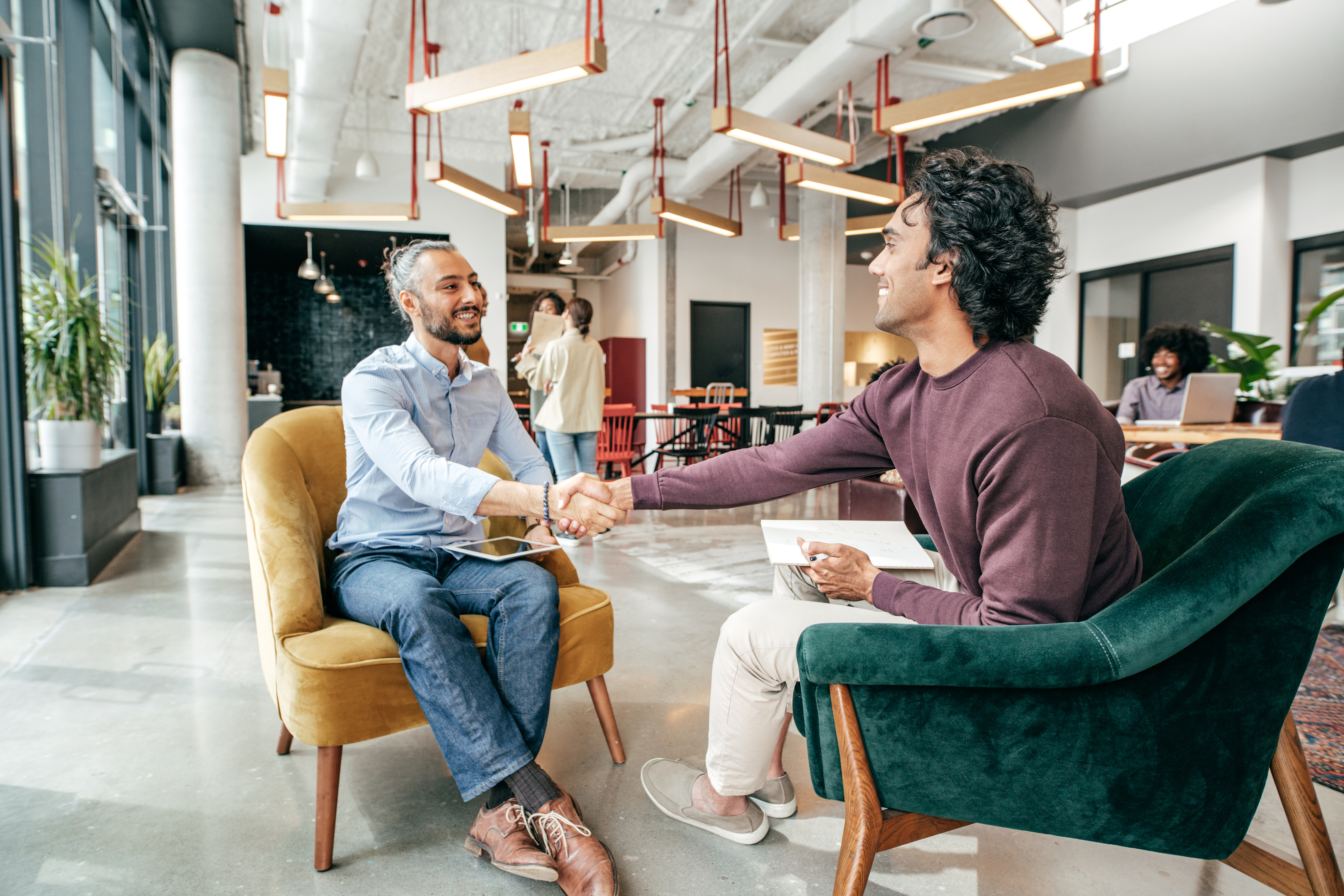 two men shaking hands during job interview